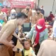 Wali Kota Bandar Lampung Meringankan Beban Anak Berkebutuhan Khusus dengan Kursi Roda pada Hari Anak Nasional