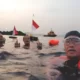HUT ke-78 RI, Komunitas Renang Pantai Kunyit Bandar Lampung Berenang 8,3 Km Bawa Bendera Merah Putih hingga Mutun